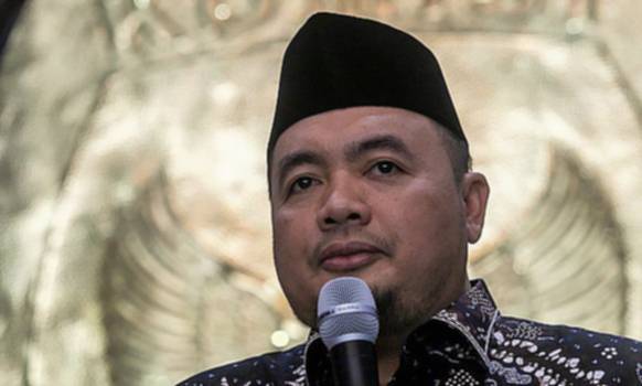 
Ketua KPU Mochammad Afifuddin pastikan merevisi PKPU terkait syarat pencalonan cakada bakal terbit sebelum masa pendaftaran. (CNNIndonesia/Adi Maulana Ibrahim)