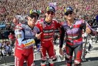 (ki-ka) Marc Marquez, Enea Bastianini, dan Jorge martin di podium usai selesaikan balapan seri MotoGP Emilia Romagna, Minggu (22/9/2024).