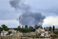 Pasukan Pertahanan Israel (IDF) mengonfirmasi mereka menyerang target di Lebanon untuk melemahkan kemampuan dan infrastruktur teroris Hizbullah, Kamis (19/9/2024). Foto Ilustrasi: Asap mengepul setelah penembakan IDF di dekat desa Tair Harfa (latar depan) di pinggiran desa Marwahin dan al-Bustan di Lebanon selatan dekat perbatasan dengan Israel utara. (AFP)