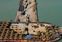 Pesanan Alat berat Haji Andi Samsudin Arsyad alias Haji Isam dari Cina terus berdatangan, pada Selasa (1/10/2024). SuarIndonesia/Ist)