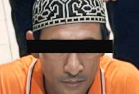 Pelaku Andi Rahman (46)