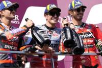 Jorge Martin, Marc Marquez, dan Francesco Bagnaia di atas podium MotoGP Australia 2024. (REUTERS/Asanka Brendon Ratnayake)