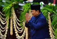 Presiden Prabowo Subianto memberi salam usai dilantik pada sidang paripurna MPR di Gedung Nusantara, Kompleks Parlemen, Senayan, Jakarta, Minggu (20/10/2024).(SuarIndonesia/ ANTARA FOTO/Rivan Awal Lingga/aww