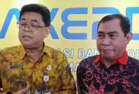 Kepala Dinas Kominfo Kalsel Muhamad Muslim (kiri) dan Ketua PWI Kalsel, Zainal Helmie