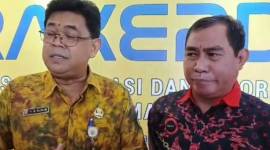 Kepala Dinas Kominfo Kalsel Muhamad Muslim (kiri) dan Ketua PWI Kalsel, Zainal Helmie