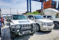 mobil-mobil mewah milik tersangka mantan bupati hst, yang masih diamankan kpk. (SuarINdonesia/Repro)