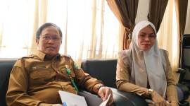 Sekretaris DP3APPKBPMD Balangan, Bejo dan JF Penggerak Swadaya Masyarakat, Ridha Mulyani.- Foto:Mc.Balangan