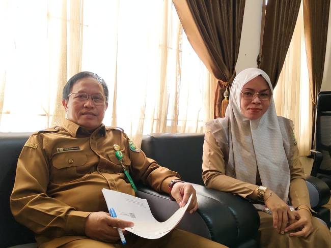 Sekretaris DP3APPKBPMD Balangan, Bejo dan JF Penggerak Swadaya Masyarakat, Ridha Mulyani.- Foto:Mc.Balangan