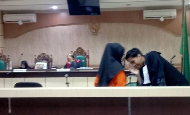 Trdakwa Maria Hartati. pada persidangan. (SuarIndonesia/HD)