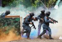 Personel Polisi Kehutanan (Polhut) menyuguhkan berbagai atraksi, Jumat ((24/1/2025). (SuarIndonesia/RW)