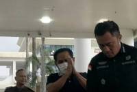 
Mantan Ketua Pengadilan Negeri (PN) Surabaya Rudi Suparmono tiba di Kejagung. (Dwi Rahmawati/detikcom)