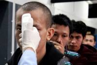 
Seorang penumpang kapal dari Malaysia menjalani pemeriksaan suhu tubuh untuk mencegah penyebaran penyakit menular dan berbahaya di Terminal Ketibaan Pelabuhan Dumai, Riau, Senin (6/1/2025). (ANTARA FOTO/Aswaddy Hamid)