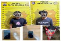 Polsek Tapin Selatan menangkap dua pengedar sabu SR dan AS saat hendak bertransaksi narkoba di Rantau, Kabupaten Tapin, Jumat (31/1/2025). (ANTARA/Muhammad RP)