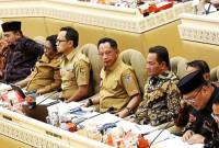 Menteri Dalam Negeri Muhammad Tito Karnavian (tengah baju cokelat). (Foto: detikcom/Agung P)