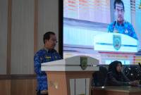 Asisten Bidang Perekonomian dan Pembangunan Setda Balangan, Tuhalus saat menyampaikan sambutan pada acara FKP penyusunan Ranwal RKPD 2026.