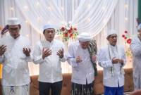 Bupati Balangan saat menghadiri peringatan Isra Mikraj di Desa Sirap, Juai.- Foto: Mc.Balangan