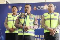 Kepala Korlantas (Kakorlantas) Polri Irjen Pol Agus Suryonugroho (tengah) dan jajaran Korlantas Polri memberikan keterangan pers kepada awak media di Gedung STIK-PTIK, Jakarta, Senin (22/9/2025). (ANTARA/Nadia P Rahmani)