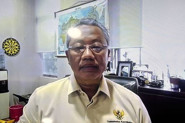 Asisten Deputi Industri Logam, Mesin, Alat Transportasi, Elektronika, dan Aneka (Ilmate) Kemenko Perekonomian, Atong Soekirman, bergabung secara daring pada forum Bisnis Indonesia di Jakarta, Kamis (25/9/2025). (ANTARA/Pamela Sakina)