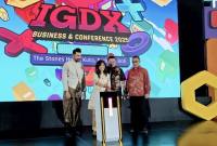 Kementerian Komunikasi dan Digital (Kemkomdigi) meresmikan sistem klasifikasi gim berdasarkan kelompok usia Indonesia Game Rating System (IGRS) dalam ajang Indonesia Game Developer Exchange (IGDX) 2025 di Badung, Bali pada Sabtu (11/10/2025). (ANTARA/Farhan Arda Nugraha)
