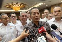 Menteri Koperasi Ferry Juliantono menjawab pertanyaan wartawan setelah menghadiri acara Monthly Economic Diplomacy Breakfast (K-MED) yang digelar Kadin Indonesia di Jakarta, Jumat (10/10/2025). (ANTARA/Shofi Ayudiana)