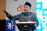 Menteri Koperasi Ferry Juliantono berbicara dalam kegiatan Bimbingan Teknis Kopdes Merah Putih yang digelar di Semarang, Jawa Tengah, Kamis (18/12/2025). (Foto: Dok Kemenkop)