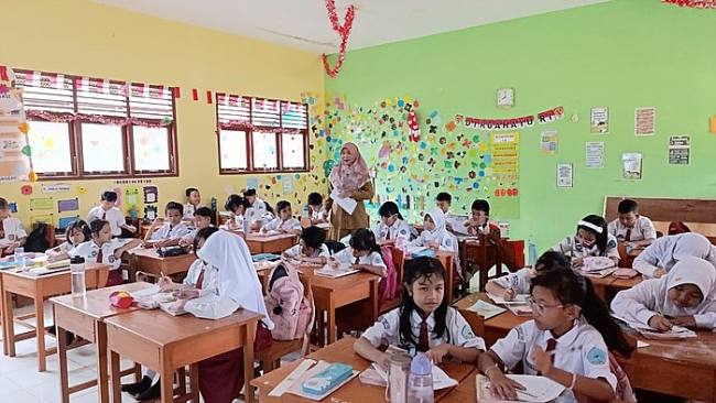 Foto Ilustrasi guru SD. (Foto: Dok Yayasan Guru Belajar)