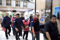 Kejati Kaltim menahan DA selaku Direktur dan GT selaku Direktur Utama yang memimpin PT JMB, PT ABE, serta PT KRA, atas dugaan korupsi lahan transmigrasi. (Dok Kejati Kaltim)