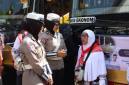 Para jemaah Minggu (26/4/2026) menuju asrama haji Banjarmasin di Kota Banjarbaru  dengan pengawalan pihak Polres Tabalong dan instansi terkait. (SuarIndonesia/Ist)