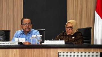 Kepala Staf Kepresidenan Muhammad Qodari (kiri) dan Menteri PPPA Arifah Fauzi dalam konferensi pers di Jakarta, Rabu (22/4/2026). (Antara/Prisca T Violleta)