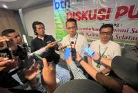 Kepala Cabang BTN Banjarmasin, Bona Pasogit Rumapea (kiri) didampingi Kepala Cabang BSN Banjarmasin, Sulthon Agung.