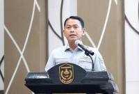Wali Kota Banjarmasin HM Yamin HR saat memberikan sambutan pada kegiatan sosialisasi penguatan daya saing pasar rakyat di Balaikota, Selasa (19/5/2026). (Foto: Humas Pemko Banjarmasin)