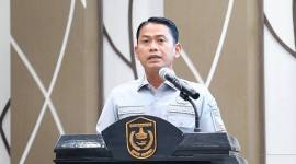 Wali Kota Banjarmasin HM Yamin HR saat memberikan sambutan pada kegiatan sosialisasi penguatan daya saing pasar rakyat di Balaikota, Selasa (19/5/2026). (Foto: Humas Pemko Banjarmasin)
