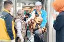 Kedatangan jemaah haji Kloter 08 Debarkasi Banjarmasin asal gabungan dari Kalsel dan Kalteng tiba di tanah air setelah melaksanakan ibadah haji tahun 1447 H / 2026 M di Bandara Syamsuddin Noor Banjarmasin, Minggu (14/6/2026). (Foto: PPIH Debarkasi Banjarmasin)