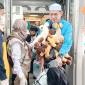 Kedatangan jemaah haji Kloter 08 Debarkasi Banjarmasin asal gabungan dari Kalsel dan Kalteng tiba di tanah air setelah melaksanakan ibadah haji tahun 1447 H / 2026 M di Bandara Syamsuddin Noor Banjarmasin, Minggu (14/6/2026). (Foto: PPIH Debarkasi Banjarmasin)