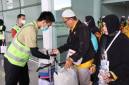 Kedatangan jamaah haji Kloter 11 Debarkasi Banjarmasin asal Kabupaten Hulu Sungai Utara (HSU) di Bandara Internasional Syamsuddin Noor Banjarmasin setelah melaksanakan ibadah haji 2026, Jumat (19/6/2026). (Foto: PPIH Debarkasi Banjarmasin)