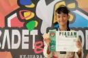 Siswi SDN 2 Sidorejo, Pangkalan Bun, bernama Dewi Putri raih medali perunggu di Kejurnas Taekwondo. (Foto: Dok Istimewa)

