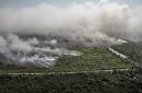 Foto udara memperlihatkan asap membumbung tinggi dari kebakaran hutan dan lahan di Desa Tumbang Nusa, Kabupaten Pulang Pisau, Kalimantan Tengah, Selasa (4/8/2026). (Foto: Antara/Auliya Rahman)