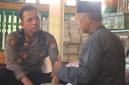 Kapolresta Banjarmasin, Kombes Pol Riza Muttaqin dan juru kunci makam, H. Hamdani