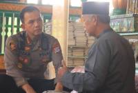Kapolresta Banjarmasin, Kombes Pol Riza Muttaqin dan juru kunci makam, H. Hamdani