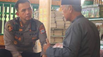 Kapolresta Banjarmasin, Kombes Pol Riza Muttaqin dan juru kunci makam, H. Hamdani
