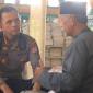 Kapolresta Banjarmasin, Kombes Pol Riza Muttaqin dan juru kunci makam, H. Hamdani