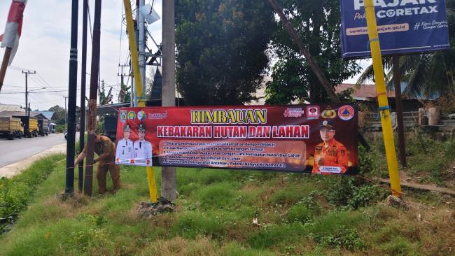 BPBD Balangan pasang spanduk imbauan di sejumlah titik strategis. Foto : MC Balangan