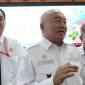 Gubernur Muhidin usai rapat persiapan Hari Jadi Kalsel. Foto : istimewa