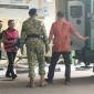 Mantan Jaksa Agung Muda Bidang Tindak Pidana Khusus (Jampidsus) Febrie Adriansyah (tengah) berjalan menuju mobil tahanan yang terparkir di kompleks Rutan KPK, Jakarta, Jumat (7/8/2026). (Foto: Antara/Rio Feisal)