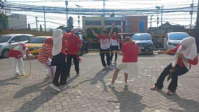 Seru dan meriah diselingi canda dan tawa para Karyawan Koperasi  Tri Capital Investama (TC Invest) Cabang Banjarmasin pada berbagai lomba menyambut momen Perayaan 17 Agustus, Jumat (14/8/2026). (SuarIndonesia/Ist)