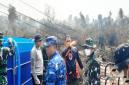 Kapolda Kalsel Irjen Pol Rosyanto Yudha Hermawan bersama Danrem 101/Antasari Brigjen TNI Ilham Yunus, Danlanud Sjamsudin Noor Kolonel Pnb Hilman LP Ambarita dan Kepala BPBD Kalsel Ronny Eka Saputra saat penanggulangan karhutla di area ring 1 Bandara Internasional Syamsudin Noor di Banjarbaru, Jumat (18/9/2026). (Foto: HO-Antara)
