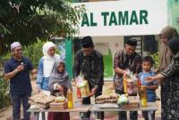  Penyerahan bantuan sembako kepada anak yatim binaan Yayasan Al Tamar Balangan, Minggu (20/9/2026). (SuarIndonesia/Adv)