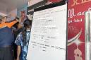 Daftar korban Kapal Virgo Transpot 8 di Posko SAR Pelabuhan Trisakti Banjarmasin. ( Foto: detikKalimantan/kahirun nisa)
