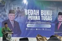 Dirut PT Bank Kalsel H Fachrudin saat beri sambutan pada Bedah Buku dan Purna Tugas Prof Dr HA Hafiz Anshary di Auditorium Mastur Jari UIN Antasari Banjarmasin, Senin (28/9/2026).